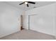 Spacious bedroom with neutral carpet, ceiling fan, and closet space at 1380 Normandy Heights Cir, Winter Haven, FL 33880