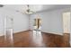 Open-concept living space with access to the pool area through sliding glass doors at 1380 Normandy Heights Cir, Winter Haven, FL 33880