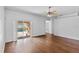 Bright living room with sliding glass doors leading to the pool area at 1380 Normandy Heights Cir, Winter Haven, FL 33880