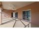 Spacious covered patio with ample space for outdoor seating and entertaining at 1380 Normandy Heights Cir, Winter Haven, FL 33880
