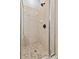 Shower stall featuring decorative tile surround and pebble floor at 1380 Normandy Heights Cir, Winter Haven, FL 33880