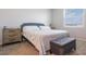 Serene bedroom with a comfortable bed, modern furniture, and a bright window at 1399 Lassen St, Haines City, FL 33844
