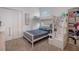 Bright bedroom featuring a bunk bed with built-in storage and a white closet at 1399 Lassen St, Haines City, FL 33844