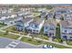 An aerial view of a residential area with well-maintained homes and landscaping at 14317 Lanikai Beach Dr, Orlando, FL 32827