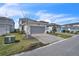 Charming single-Gathering home with a two-car garage and well-maintained landscaping at 14317 Lanikai Beach Dr, Orlando, FL 32827