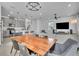 Open-concept living space with kitchen, dining and media areas, perfect for gatherings at 14317 Lanikai Beach Dr, Orlando, FL 32827