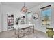 Bright and contemporary office space with modern desk, shelves, and natural light at 14317 Lanikai Beach Dr, Orlando, FL 32827