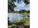 Beautiful view of the lake from the backyard of the property at 1484 Patricia St, Kissimmee, FL 34744