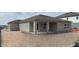 View of the exterior elevation of the home in the back yard at 1667 Meadowlark Dr, Deltona, FL 32725