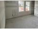 Bedroom featuring three large windows for natural light and an airy feel at 1667 Meadowlark Dr, Deltona, FL 32725