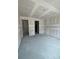 Spacious living room with multiple entryways and ample natural light at 1667 Meadowlark Dr, Deltona, FL 32725