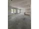 An unfinished living room allows customization with neutral walls and bright natural light at 1667 Meadowlark Dr, Deltona, FL 32725
