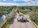 An aerial view of the gated community entrance with luxury homes and waterfront property at 1679 Shadowmoss Cir, Lake Mary, FL 32746