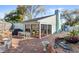 Beautiful outdoor space with a patio, dining set, and views of the surrounding landscaping at 17 Hibiscus Ct, Eustis, FL 32726