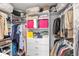 Walk-in closet with custom shelving and ample storage space for clothes and accessories at 17 Hibiscus Ct, Eustis, FL 32726