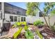Relaxing backyard with brick paver patio, mature trees and screened in porch at 17 Lawn St, Oviedo, FL 32765