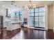 Open-concept kitchen featuring stainless steel appliances, a marble island, and natural lighting at 1816 Mondrian Cir, Winter Park, FL 32789