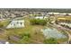 Aerial view of community recreational facilities including tennis courts, pool, and basketball courts at 2026 Cypress Bay Blvd, Kissimmee, FL 34743