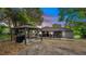 Enjoy outdoor living with this backyard featuring a large gazebo, bar, grill and covered patio with bar seating at 216 Clara Vista St, Debary, FL 32713