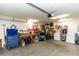 Spacious garage with workbench, tool storage, and laundry area, offering functionality and ample space at 216 Clara Vista St, Debary, FL 32713