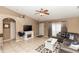 Spacious living room with a fireplace, neutral walls, tiled floors, and plenty of natural light at 216 Clara Vista St, Debary, FL 32713