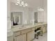 Bright bathroom featuring double sinks and a spacious vanity area at 2230 Lake Crescent Ct, Windermere, FL 34786