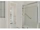 Bathroom including shower, toilet, and door to outside at 2230 Lake Crescent Ct, Windermere, FL 34786