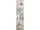Bedroom featuring corner windows, ceiling fan, and neutral carpeted floors at 2230 Lake Crescent Ct, Windermere, FL 34786