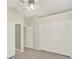 Spacious bedroom with a ceiling fan, a closet, and an ensuite bathroom at 2230 Lake Crescent Ct, Windermere, FL 34786