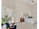 Comfortable bedroom with connecting bathroom with a soft color palette and carpeted floor at 2230 Lake Crescent Ct, Windermere, FL 34786