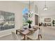 Comfortable dining room with abundant natural light and views to living areas at 2230 Lake Crescent Ct, Windermere, FL 34786