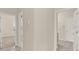 Hallway with neutral tile floors leading to bedrooms and bathrooms at 2230 Lake Crescent Ct, Windermere, FL 34786