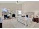 Spacious main bedroom featuring a ceiling fan, and large windows at 2230 Lake Crescent Ct, Windermere, FL 34786