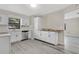 Modern kitchen boasting updated appliances, sleek countertops, and ample cabinet space at 226 Noxon St, Auburndale, FL 33823