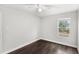 Bedroom with a ceiling fan and view of outside at 2361 Carriage Run Rd, Kissimmee, FL 34741