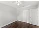 Bedroom with hardwood floors, ceiling fan and spacious closet at 2361 Carriage Run Rd, Kissimmee, FL 34741