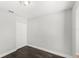 Bedroom featuring dark wood floors, neutral walls and a closet at 2361 Carriage Run Rd, Kissimmee, FL 34741