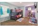 Charming bedroom with bunk beds, playful decor, and lots of natural light at 2631 Archfeld Blvd, Kissimmee, FL 34747
