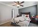 bedroom features carpeting, closet, and Mickey Mouse themed bedding and decor at 2631 Archfeld Blvd, Kissimmee, FL 34747