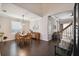Dining room with a glass table, wood floors and natural light at 2631 Archfeld Blvd, Kissimmee, FL 34747