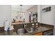 Kitchen with granite countertops and stainless steel sink at 2631 Archfeld Blvd, Kissimmee, FL 34747