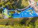 Aerial view of a water park featuring slides and splash pad, great for Gathering fun at 2631 Archfeld Blvd, Kissimmee, FL 34747