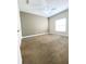 Spacious bedroom with neutral carpet, natural light, and a ceiling fan at 2956 Lucayan Harbour Cir # 108, Kissimmee, FL 34746