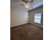 Bedroom with carpet, a ceiling fan and natural light at 2956 Lucayan Harbour Cir # 108, Kissimmee, FL 34746