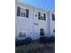 A view of the exterior of a building, numbered 3 and 2956 at 2956 Lucayan Harbour Cir # 108, Kissimmee, FL 34746