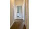 Upstairs hallway leading to a bathroom and bedroom with a closet on the right at 2956 Lucayan Harbour Cir # 108, Kissimmee, FL 34746