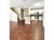 Open-concept living area flowing into a modern kitchen with staircase access at 2956 Lucayan Harbour Cir # 108, Kissimmee, FL 34746
