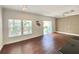 Open concept living room with views of kitchen and windows overlooking the lanai at 2956 Lucayan Harbour Cir # 108, Kissimmee, FL 34746