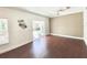 Bright living area with laminate flooring, a ceiling fan, and sliding door to the patio at 2956 Lucayan Harbour Cir # 108, Kissimmee, FL 34746
