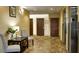 Hotel hall featuring seating, carpet, elevators, and multiple doors at 3000 Maingate Ln # 520, Kissimmee, FL 34747